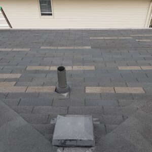 Asphalt shingle roof with new and old shingles side by side – Trenton