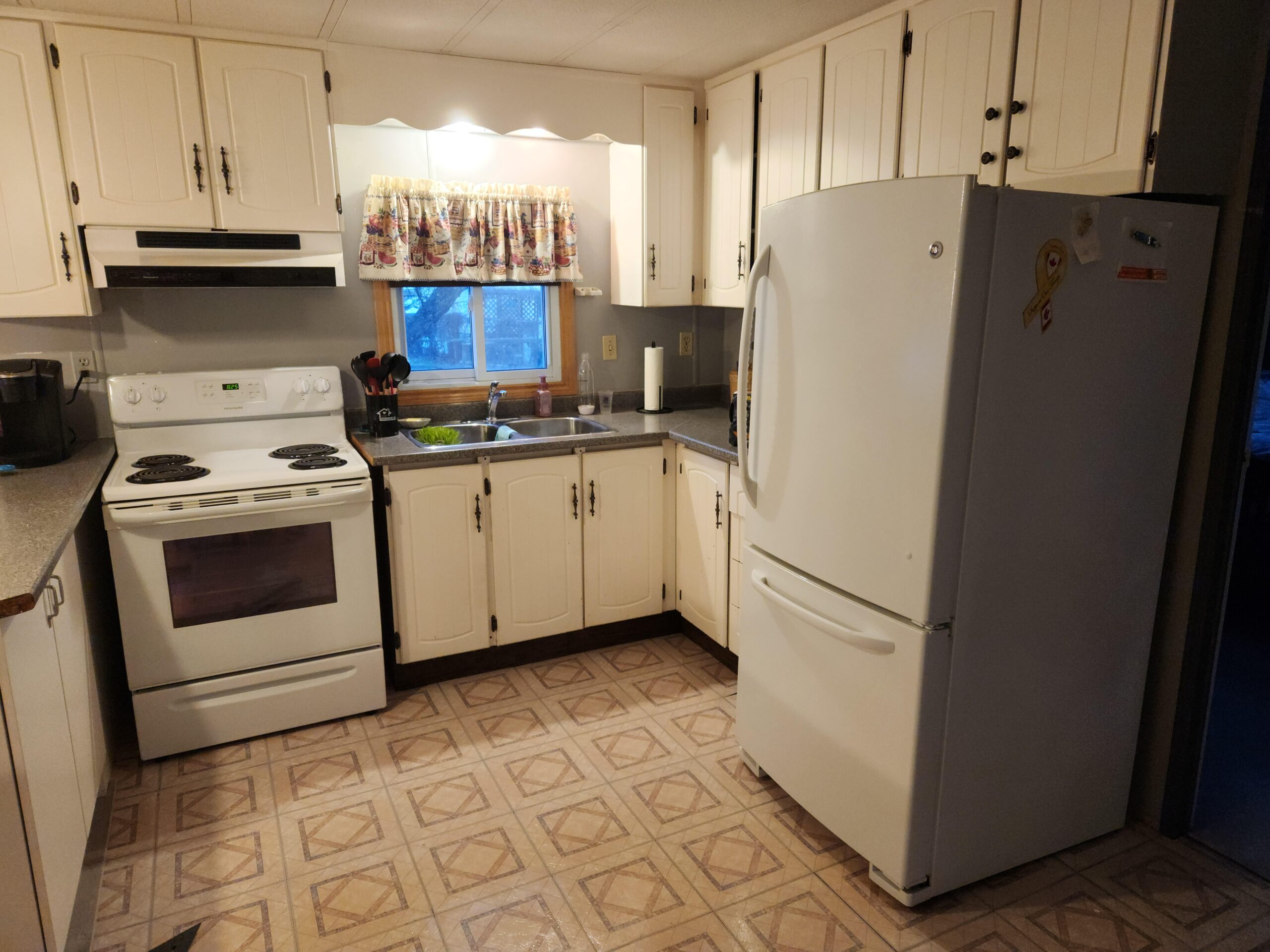 Mobile home kitchen floor before vinyl plank installation – Belleville