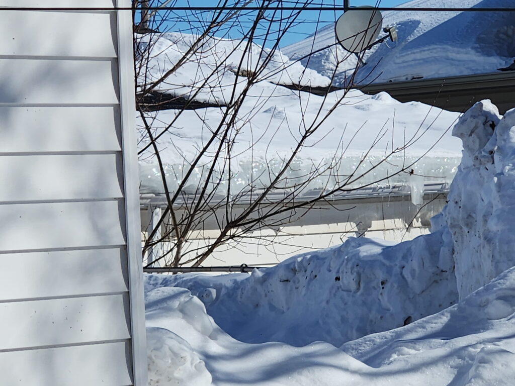 Poor attic insulation contributing to ice dam formation