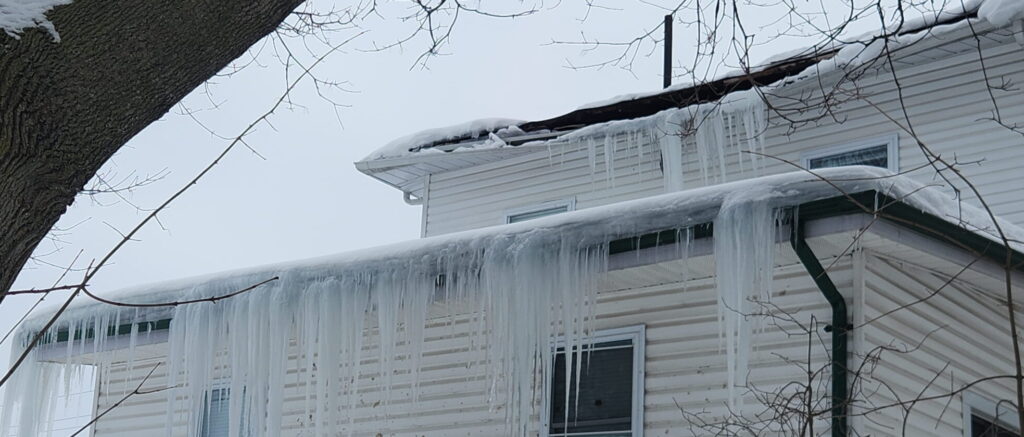 Winter roof ice problem in Trenton residential neighborhood