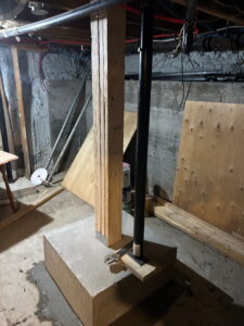 Footing and post during interior renovation in Belleville, Ontario